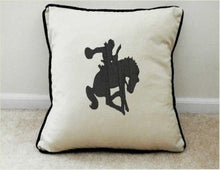 Load image into Gallery viewer, Throw pillow cover, natural color cotton material, black piping around the edge, 18&quot;x 18&quot; or 20&quot; x 20&quot;, embroidered silhouette of a bronc rider, Will make a wonderful western accent pillow for your couch, chair, bed, office, or to decorate your entryway - Borgmanns Creations
