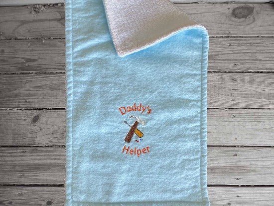 This Onesie and burp cloth set with the saying, Daddy's Helper, Onesie size - 18 mo T shirt, light blue burp cloth is 16" x 8", made of flannel top and white terry cloth backing to keep mom dry from those frequent spit ups. Give as a new mom gift, gift for the new born or baby shower gift -Borgmanns Creations - 3