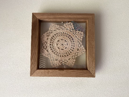 Crochet doily -  one of a kind wall hanging, or it can stand alone on any side -  wonderful gift country farmhouse decor - bedroom decor ideas for your home or a special gift - doily is vintage star pattern between 2 pieces of acrylic and framed in wood-  a piece of material to complement the doily - 7 1/8" H x 7 1/8" W x 1 1/4" D- Borgmanns Creations - 4