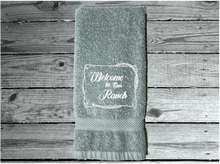 Load image into Gallery viewer, gray Bath Hand Towel - embroidered saying &quot; Welcome To Our Ranch&quot; - western gifts - country farmhouse decor - new couple wedding gift - bathroom / kitchen - this terry towel can be a barn work towel - housewarming / birthday gift - Borgmanns Creations 
