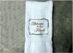 white Bath Hand Towel - embroidered saying " Welcome To Our Ranch" - western gifts - country farmhouse decor - new couple wedding gift - bathroom / kitchen - this terry towel can be a barn work towel - housewarming / birthday gift - Borgmanns Creations