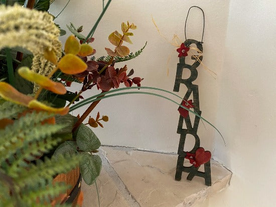 Family name sign -one of a kind - laser Cut family name design for Grandpa's birthday gift - wall hanging - Fathers Day, birthday gift - .laser cut luan wood, layered, flowers, acrylic paint, wire for hanging - 12" H x 3" W x 1/4" D - Borgmanns Creations -2