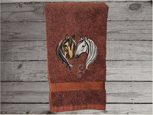 Load image into Gallery viewer, Brown hand towel for a horse lovers gift, this classy embroidered design of 2 horse heads on a luxury terry hand towel, 16&quot; x 27&quot;, will make your bathroom or kitchen decor, country western decor for the farmhouse family.  Personalize this towel as a gift for a friend, birthday gift or house warming gift - Borgmanns Creations  - 4
