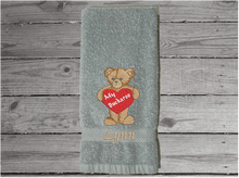 Load image into Gallery viewer, Gray Valentines Day hand Towel, terry towel soft and absorbent, teddy bear and heart embroidered design 16&quot; x 27&quot;, great gift to your sweet heart for this holiday. Pick a towel color to go with her bathroom or kitchen decor, for that special I love you - Borgmanns Creations 
