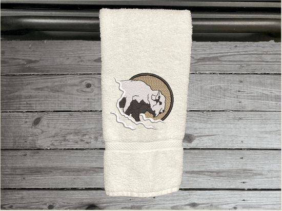 White hand towel embroidered Southwest decor with buffalo head will make the west come alive. A terry hand towel 16" x 30" is just the gift for the Southwest theme for bathroom or kitchen, to make the romance of the old west come alive. Will make a wonderful farmhouse housewarming gift or for your own home. decor - Borgmanns Creations - 5