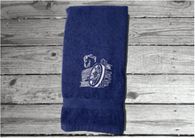 Load image into Gallery viewer, Blue hand towel western theme, embroidered wagon and horse head on a cotton terry towel, soft and absorbent, 16&quot; x 27&quot;, the perfect western cowboy design for your gusts to enjoy while at your ranch of home, personalized home decor - Borgmanns Creations 
