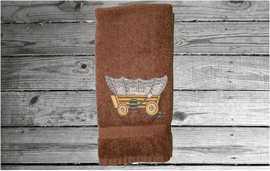 Brown hand towel cover wagon embroidered design, cotton terry towel, soft and absorbent, 16" x 27", give  this custom towel to the RV travelers you know or even show it off in your RV. Personalized gift for a friend - Borgmanns Creations 