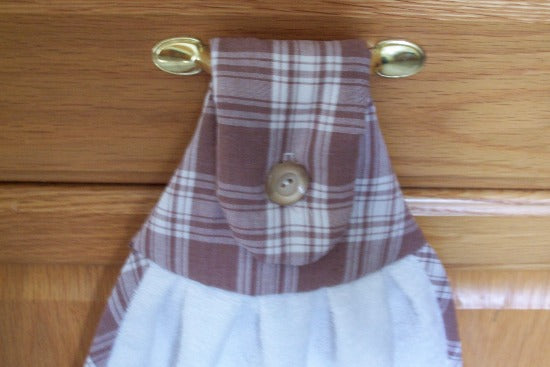 White kitchen hanging hand towel with embroidered horse - western farmhouse kitchen decor -  towel has a top of brown checkered material top is batting filled - ribbing around towel matching top - button for attaching to handle, 15" x 24" - he perfect gift for mom for her birthday gift to display in the kitchen - Borgmanns Creations - 3