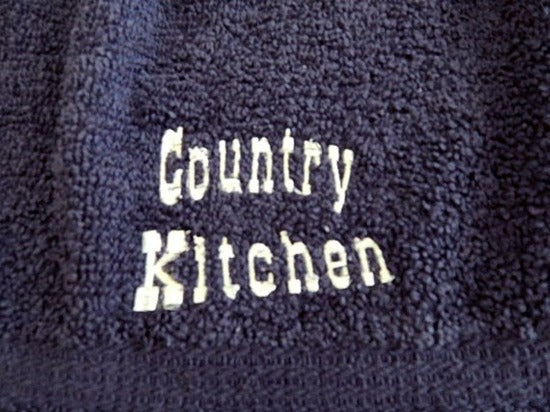 Blue kitchen hanging towel with embroidered saying " Country Kitchen "   -  country farmhouse kitchen decor -  gift for a friend or family member - cotton towel with cotton material for the top  14" x 15" with a 5" cotton print top and button to fasten - Borgmanns Creations - 3