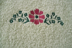 Green kitchen hand towel set - embroidered flower design for the kitchen decor - dish and hand towel set a gift for mom - embroidered flower on both towels and hand towel ( back side) is words "have a nice day" - cream color top, quilted material with a button hand towels 13" x 21" - hanging towel 16 1/2" x 13" - Borgmanns Creations - 2
