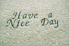 Load image into Gallery viewer, Green kitchen hand towel set - embroidered flower design for the kitchen decor - dish and hand towel set a gift for mom - embroidered flower on both towels and hand towel ( back side) is words &quot;have a nice day&quot; - cream color top, quilted material with a button hand towels 13&quot; x 21&quot; - hanging towel 16 1/2&quot; x 13&quot; - Borgmanns Creations - 3
