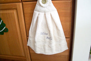 Beige hanging towel - silver bells - perfect Christmas gift for mom with embroidered words Silver Bells for her kitchen decor - It can also be hooked over a bathroom cabinet handle - home decor premium terry towel is 16" wide - 21" long - Borgmanns Creations - 4