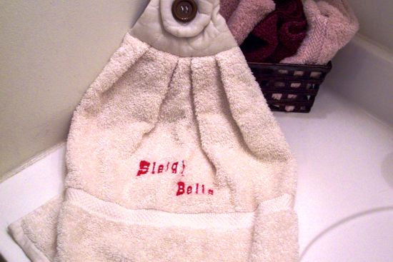 Beige kitchen hanging towel - embroidered words (Sleigh Bells) - Christmas gift for mom - kitchen decor - hooked over a bathroom or kitchen cabinet handle - a hanging towel beige quilted top with button on strap - housewarming gift -  hostess gift for the holidays - Borgmanns Creations 4