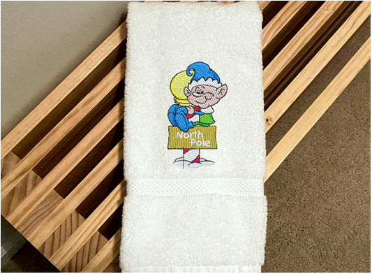 White Hand Towel - North Pole Christmas hand towel embroidered design of a pixie gift for mom - Christmas decoration for her bathroom decor or kitchen decor, for the holidays - terry towel soft and absorbent 16" x 30" -  gift for a friend, personalized new home gift  -Borgmanns Creations 