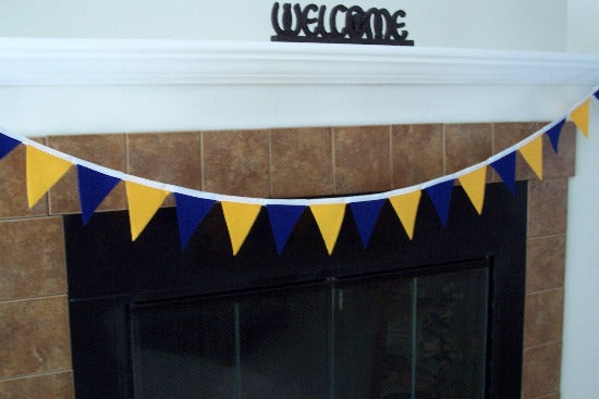 Party banner, blue and gold felt flags, 19 flags each 3 1/2" x 4 1/2" of soft felt sewn to bias tape, The flag section is 6 feet and there is 2ft of white bias tape on each side for tying. Great for the kids room, photo prop, high school, collage, etc. Wonderful decoration for any party. Easy to store and reuse - Borgmanns Creations 