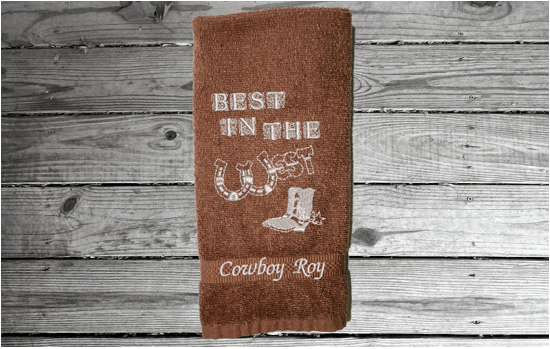 Brown western hand towel, terry towel, soft and absorbent, 16" x 27", embroidered design "Best in The West" with horseshoe and cowboy boot, for your spouse for your anniversary or their birthday to display in the bathroom or kitchen - Borgmanns Creations 