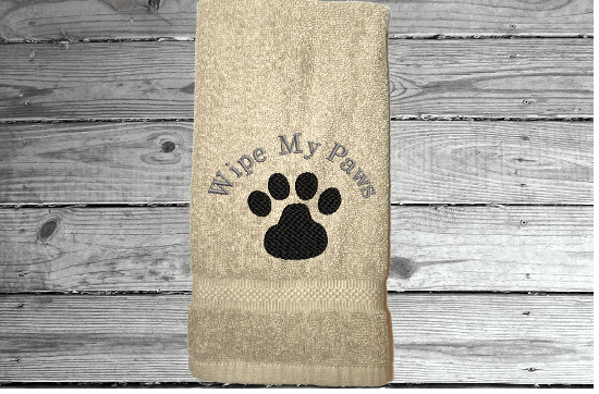 Beige hand towel, pet gift, embroidered paw print, for wiping your pets feet from the rain and snow, car towel for your pets needs, a custom terry towel soft and absorbent, 16" x 27", gift for the pet owner. A towel for drying after a bath can always come in handy to be kept in with the dog supplies - Borgmanns Creations - 1