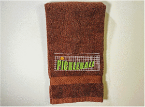 Brown Pickleball sports towel, terry hand towel soft and absorbent 16" x 27" - custom embroidered  design of a net with the word Pickleball, will make the perfect gift for the Pickleball player as a welcome to the team or for your partner. Personalize it just for them as a birthday or anniversary gift - Borgmanns Creations 