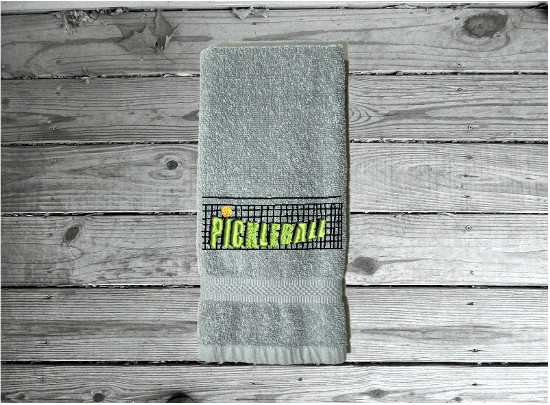 Gray Pickleball sports towel, terry hand towel soft and absorbent 16" x 27" - custom embroidered  design of a net with the word Pickleball, will make the perfect gift for the Pickleball player as a welcome to the team or for your partner. Personalize it just for them as a birthday or anniversary gift - Borgmanns Creations 