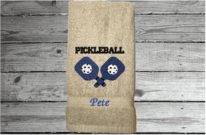 Beige Pickleball hand towel - embroidered rackets and ball on a terry towel  soft and absorbent 16" x 27", for the hard playing player. Personalized gift for a special person or for the teem. Birthday gift for mom or dad.  Borgmanns Creations 1