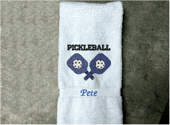 White Pickleball hand towel - embroidered rackets and ball on a terry towel soft and absorbent 16" x 27", for the hard playing player. Personalized gift for a special person or for the teem. Birthday gift for mom or dad. Borgmanns Creations 4