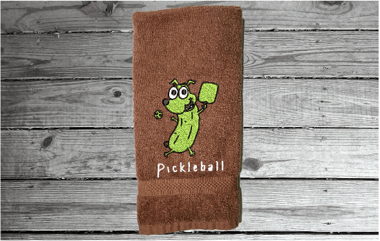 Brown Pickleball sports hand towel, custom  - Borgmanns Creations - 1embroidered design of a cute pickle, great gift for teem mates or for your partner in the game. Terry towel soft and absorbent 16" x 27". Home decor for the sports loving person - Borgmanns Creations 