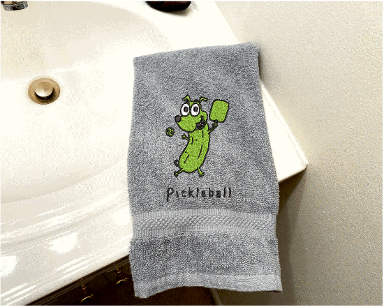 Gray Pickleball sports hand towel, custom  - Borgmanns Creations - 1embroidered design of a cute pickle, great gift for teem mates or for your partner in the game. Terry towel soft and absorbent 16" x 27". Home decor for the sports loving person - Borgmanns Creations 