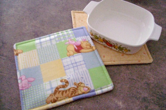 Pot Holder Set, 2 layers of Insul-Bright in the center of unbleached muslin, 8" x 8" Winnie the Pooh pattern to lighten up your kitchen decor, gift for mom who's family likes cartoon characters. Housewarming gift, home decor - Borgmanns Creations 