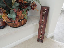 Load image into Gallery viewer, Seasons Greetings wall hanging - Christmas decor gift for mom - wood wall plaque - laser cut lauan wood glued to a 1&quot; beveled edge wood with mahogany stain, hanging hook on back - housewarming gift teacher gift - gift for a coworker - 20&quot; x 3 1/2&quot; - Borgmanns Creations
