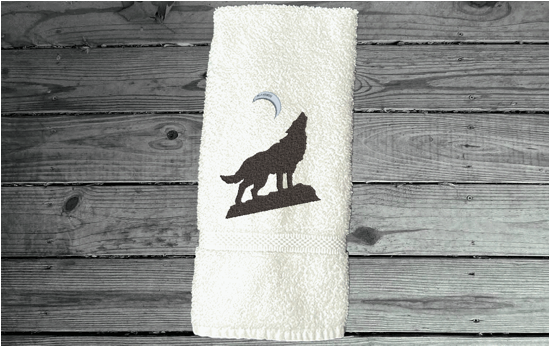 White wolf hand towel, beautiful design of a howling wolf under the moon, embroidered on a terry towel,  soft and absorbent, 16" x 30", a home decor addition for a farmhouse bathroom, kitchen for guest bath - Borgmanns Creations 