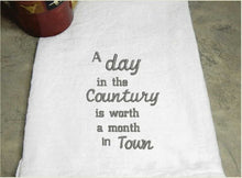 Load image into Gallery viewer, Country tea towel flour sack - embroidered saying &quot;A day in The Country is Worth a Month in Town&quot; - order one for your home decor or give as a house warming gift, holiday gift, or birthday gift, wedding shower gift - Borgmanns Creations -2
