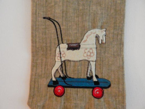 Horse wall hanging tapestry - green brown -  embroidered old fashioned rocking horse - backing of polyester hung on a dowel rod and has a twine hanger -  tassel at bottom -  farmhouse decor gift for mom -nursery decor door hanger - Borgmanns Creations 1