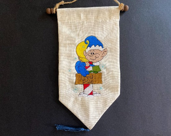 Pixie wall hanging banner - Christmas decorations - embroidered pixie tapestry - gift for family or friend - Lined backing  - hung from a dowel stick - jute hanger - tassel at bottom - Farmhouse decoration gift for mom - Borgmanns Creations 