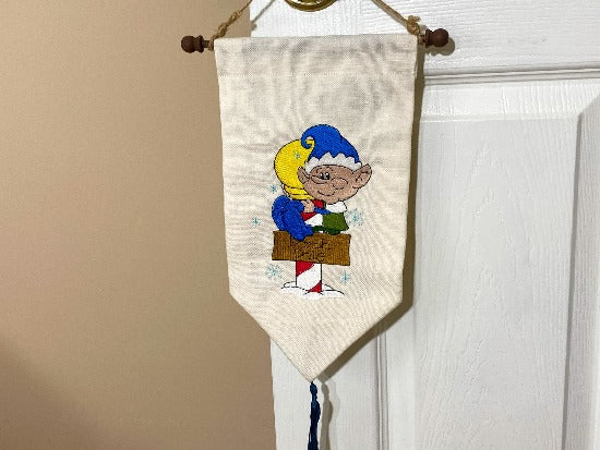Pixie wall hanging banner - Christmas decorations - embroidered pixie tapestry - gift for family or friend - Lined backing  - hung from a dowel stick - jute hanger - tassel at bottom - Farmhouse decoration gift for mom - Borgmanns Creations 