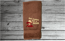 Load image into Gallery viewer, Brown bath hand towel western decor theme - farmhouse decor rustic look - decorative house warming gif - bath / kitchen - embroidered saying &quot;Real Cowboys Trust in Jesus&quot; - gift for the western family - -Borgmanns Creations 2
