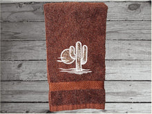 Load image into Gallery viewer, Brown Southwest hand towel, terry towel 16&quot; x 27&quot; - white towel 16&quot; x 30&quot; embroidered design makes a nice addition for your farmhouse bathroom decor, kitchen decor or for a guest bath. A wonderful wedding gift, shower gift, housewarming gift, birthday gift, etc. - Borgmanns Creations
