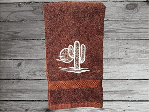 Brown Southwest hand towel, terry towel 16" x 27" - white towel 16" x 30" embroidered design makes a nice addition for your farmhouse bathroom decor, kitchen decor or for a guest bath. A wonderful wedding gift, shower gift, housewarming gift, birthday gift, etc. - Borgmanns Creations