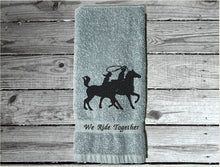 Load image into Gallery viewer, Gray embroidered bath hand towel, a wonderful design, silhouette of a couple on horseback, terry towel 16&quot; x 27&quot;, Can personalize the towel with name or saying, farmhouse decor western design, wedding gift new couple gift, for bathroom or kitchen. Make it a work towel for the barn, housewarming or birthday gift - Borgmanns Creations - 2
