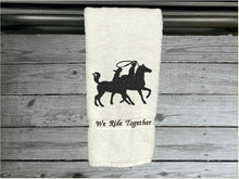Load image into Gallery viewer, White embroidered bath hand towel, a wonderful design, silhouette of a couple on horseback, terry towel 16&quot; x 27&quot;, Can personalize the towel with name or saying, farmhouse decor western design, wedding gift new couple gift, for bathroom or kitchen. Make it a work towel for the barn, housewarming or birthday gift - Borgmanns Creations - 3
