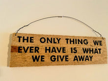 Load image into Gallery viewer, Rustic sign cedar upcycled fence panel with the saying &quot;The only thing we have is what we give away&quot;, hand painted,  4&quot; H x 13&quot; W hung by wire, would be a unique one of a kind housewarming gift or unique farmhouse decor. The natural wood color will go with any room - Borgmanns Creations 
