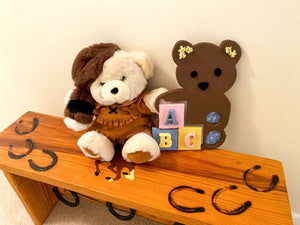 Wood wall art wall hanging, 1/2" MDF board, layered wood, hand painted brown, with wire, pompom balls, flowers and hanging hook on the back, 14" H x 10" W x 1/2" D, this wood sculpture of a brown teddy bear would be a great baby shower gift for the farmhouse decor or even leaning against a wall at floor level - Borgmanns Creations