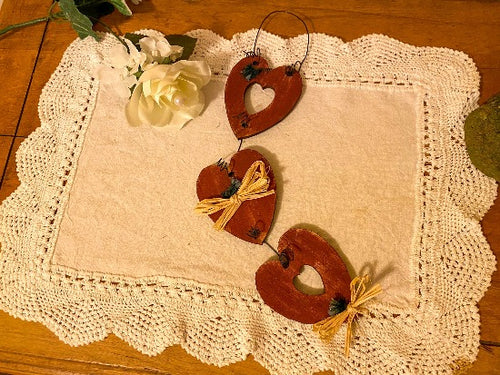 3 Hearts - Wood Wall Hanging - 2 Hearts Have Open Centers - Hung By Wire  And  Connected By Wire - With Small Flowers and Raffia to Finish It Off -Borgmanns Creations