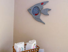 Load image into Gallery viewer, Wood wall art wall hanging, this wood sculpture of a fish is perfect for the nautical bathroom decor for that lake house decor. 1/2 MDF board, layered wood, hand painted, with wire, material, flowers, and hook on the back, 12&quot; H x 13&quot; W x 1&quot; D - Borgmanns Creations 
