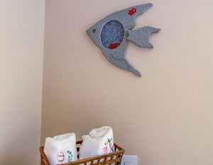 Wood wall art wall hanging, this wood sculpture of a fish is perfect for the nautical bathroom decor for that lake house decor. 1/2 MDF board, layered wood, hand painted, with wire, material, flowers, and hook on the back, 12" H x 13" W x 1" D - Borgmanns Creations 