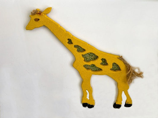 Yellow giraffe stone like wall decor with wire details, layered ears, hand painted, 21" H x15" W x1/2" D, material - green and white for spots, twine, flowers and hanging hooks on back. Just the gift for the giraffe collector. Makes a wonderful baby shower gift for the nursery - Borgmanns Creations 