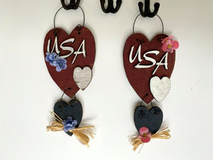 Wood wallart "USA" laser cut Luan wood, wire attaches 2 pieces, acrylic paint, glued together, flowers and raffia to complete the wall art, 10" x 4" including wire hanger, wall art will add to your home decor for the holidays, kitchen, living room, den or hallway. Perfect summer and 4th of July decoration - Borgmanns Creations 