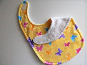 This bib and burp cloth set of butterflies with yellow background is made of flannel top and terry cloth backing, bib 9" from neck to bottom- 8" wide with sticky fasteners,  burp cloth is 16" x 8" to keep the baby dry from those frequent spills. Makes a great new mom gift, new born gift or baby shower gift.  Custom gift for a toddler - Borgmanns Creations - 2